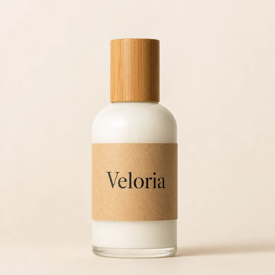 A white glass bottle of Veloria Bamboo Essence with a kraft paper wrap label and a turned bamboo cap